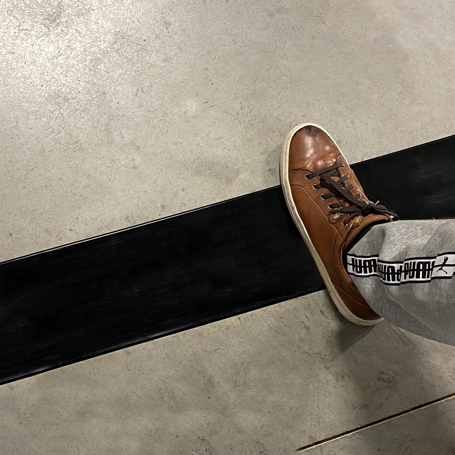 SmartSign Black 4 inch x 100 feet Floor Marking Tape, 32 mil Vinyl Floor Tape, Superior Mark Industrial Use Safety Tape with Beveled Edges, Strong Adhesive, for Gym/Warehouse/Courts