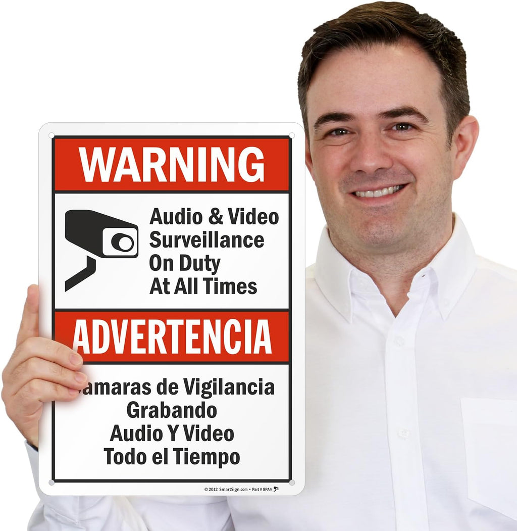 SmartSign-S-9392-AL-14 Warning - Audio & Video Surveillance On Duty At All Times Bilingual Sign By | 10" x 14" Aluminum - Black/Red on White