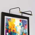 Cocoweb 12 Inch Tru-Slim Black and Brass Picture Light - LED, 2700K, Adjustable Arm, Plug-in, Toggle Switch, Sleek and Compact Design