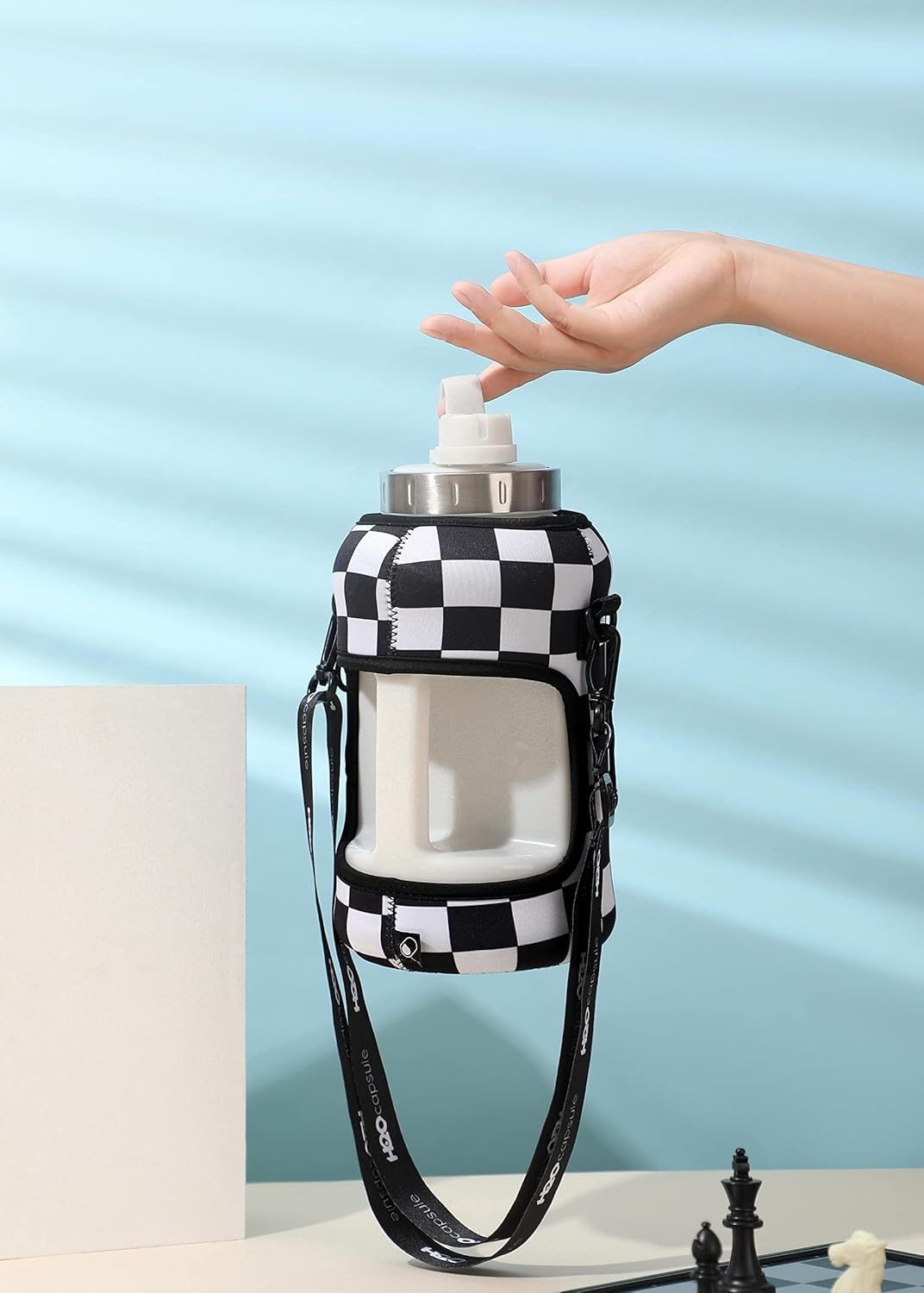 H2O Capsule 2.2L Half Gallon Wide Mouth Water Bottle with Storage Sleeve and Removable Straw - Hydration Tracker Jug with Measurements Marked – Shatterproof BPA-Free, (Check Mate)