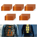 Non Fading Orange Reflective Stickers 1 inch X 2 inch, Outdoor Waterproof High Visibility Warning Safety Adhesive Reflector Tape (50 Pcs)