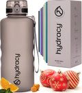 Hydracy Water Bottle with Time Marker -Large BPA Free Water Bottle & No Sweat Sleeve -Leak Proof Gym Bottle with Fruit Infuser Strainer & Times to Drink -Ideal for Fitness Sports & Outdoors