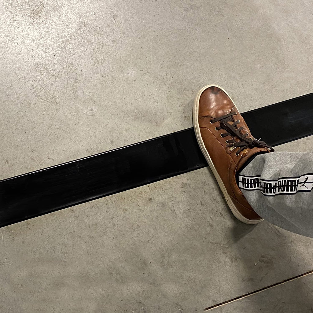 SmartSign Black 2 inch x 100 feet Floor Marking Tape, 32 mil Vinyl Floor Tape, Superior Mark Industrial Use Safety Tape with Beveled Edges, Strong Adhesive, for Gym/Warehouse/Courts