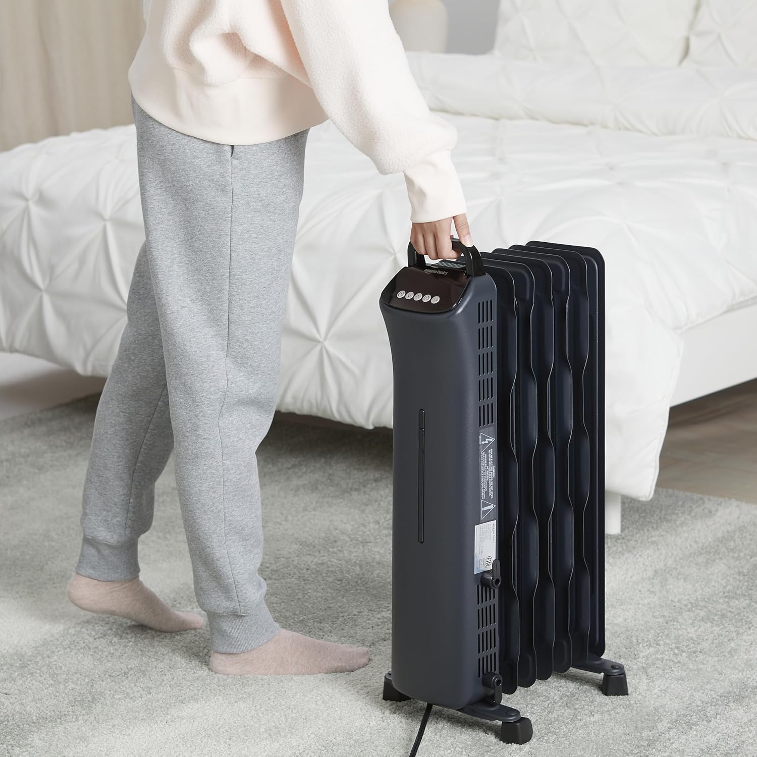 Amazon Basics Oil Space Heater with Remote Control, Portable Radiator Heater with 7 Oil-Filled Fins Indoor Uses, 3 Heat Settings, Thermostat, Tip-Over Protection, ETL Safety Certificate, 1500W, Black