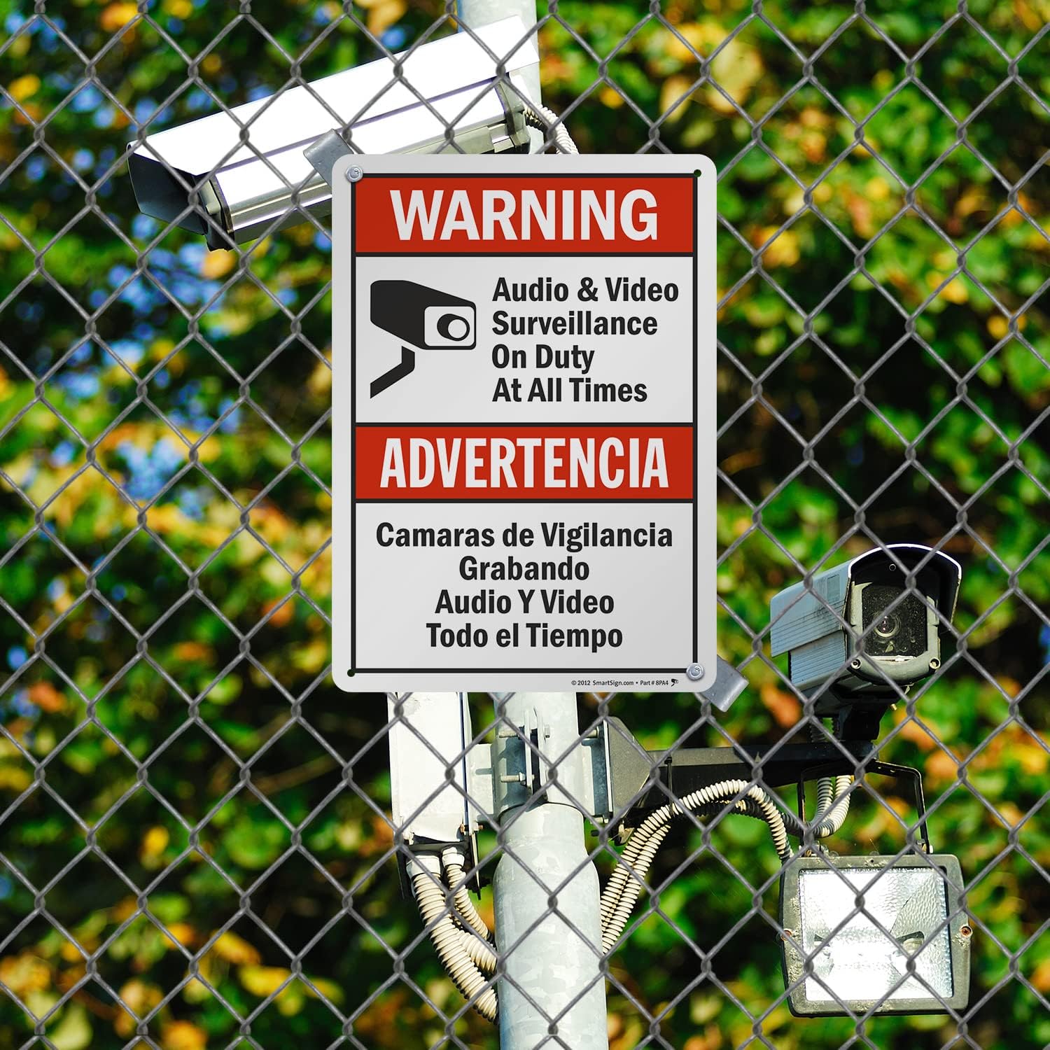 SmartSign-S-9392-AL-14 Warning - Audio & Video Surveillance On Duty At All Times Bilingual Sign By | 10" x 14" Aluminum - Black/Red on White