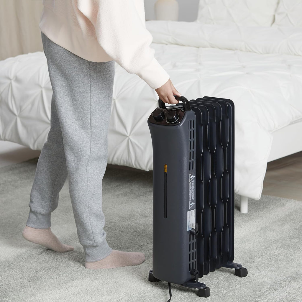 Amazon Basics Oil Space Heater, Portable Radiator Heater with 7 Oil-Filled Fins for Indoor Use, 3 Heat Settings, Thermostat, Tip-Over Protection, ETL Safety Certificate, Manual Control, 1500W, Black