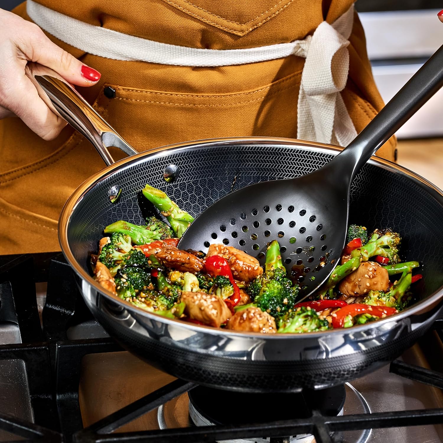 HexClad Hybrid Nonstick 10-Inch Wok with Stainless Steel Lid, Stay-Cool Handle, Dishwasher-Friendly, Oven-Safe Up to 900°F, Induction Ready, Compatible with All Cooktops